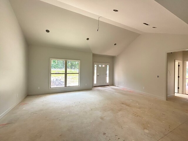 6161 Eddins Rd, Dothan, AL 36301 - unfurnished living room featuring lofted ceiling and baseboards
