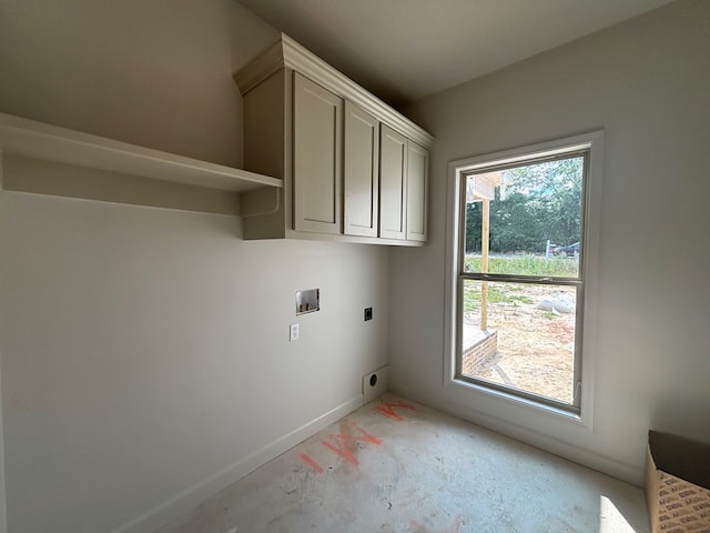 6161 Eddins Rd, Dothan, AL 36301 - laundry area with electric dryer hookup, washer hookup, and cabinet space