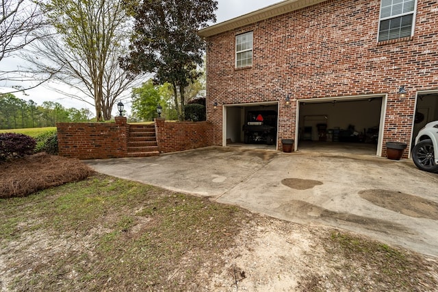 view of property exterior with a garage