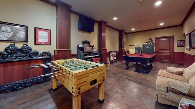 game room featuring wooden walls, ornamental molding, and pool table