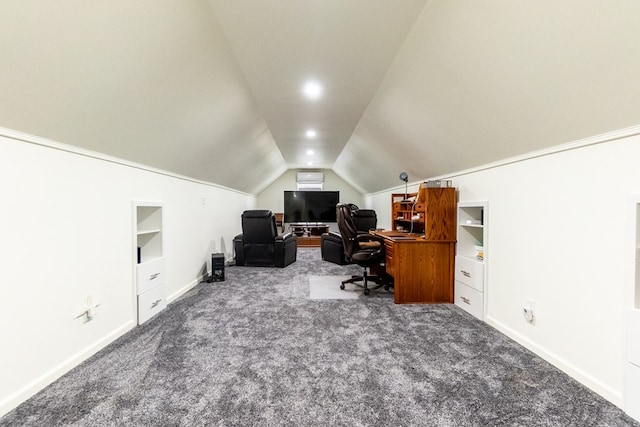 carpeted office featuring lofted ceiling