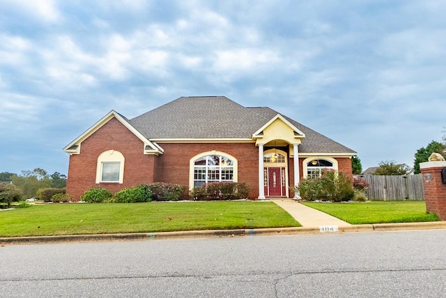 view of front of home with a front yard