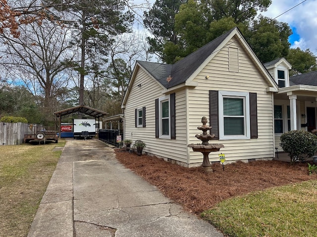 view of property exterior with a shingled roof, crawl space, and a lawn