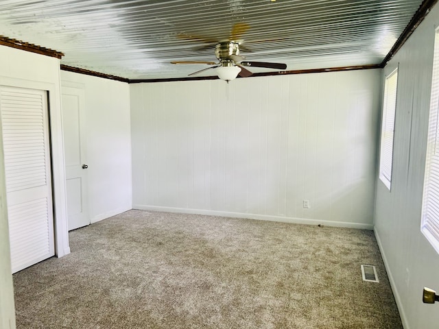 403 W Main St, Samson, AL 36477 - unfurnished room with a ceiling fan, carpet, and ornamental molding