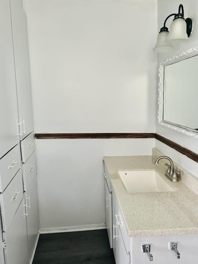 403 W Main St, Samson, AL 36477 - bathroom with vanity and wood finished floors