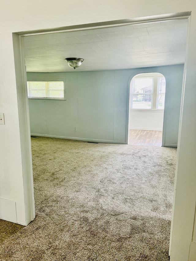 403 W Main St, Samson, AL 36477 - spare room with carpet and arched walkways