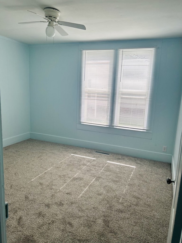 403 W Main St, Samson, AL 36477 - unfurnished room featuring carpet floors and a ceiling fan