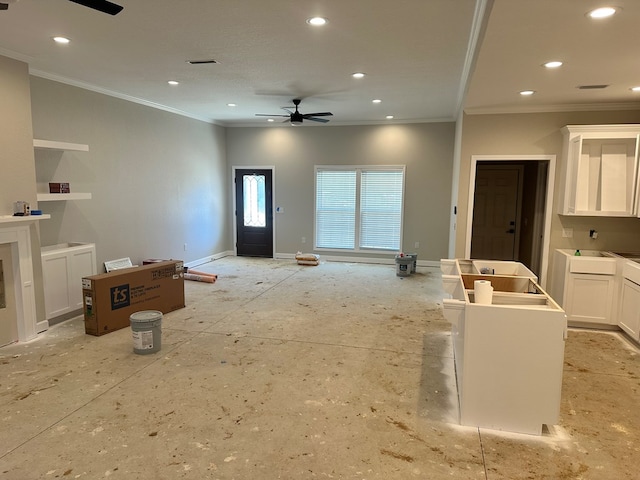 living area with recessed lighting, a ceiling fan, baseboards, and ornamental molding