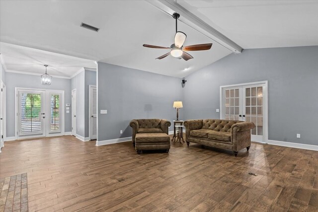 living area with dark wood-type flooring, french doors, visible vents, and ceiling fan with notable chandelier