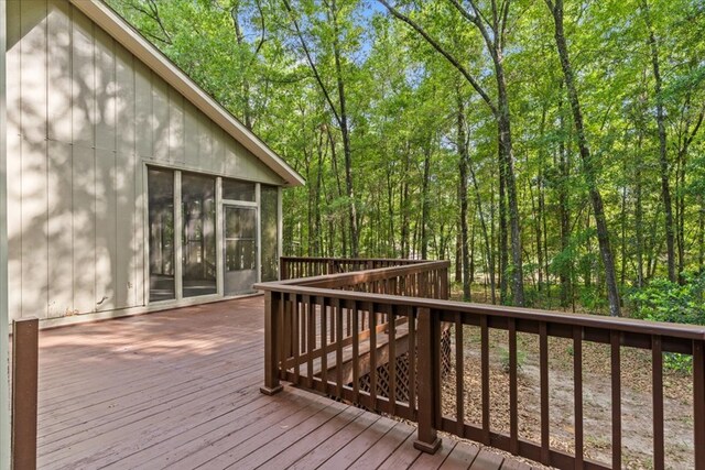 deck with a sunroom