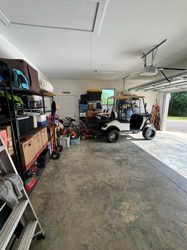garage featuring a garage door opener