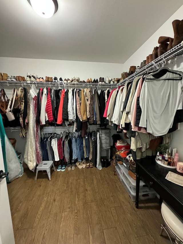 spacious closet with wood finished floors