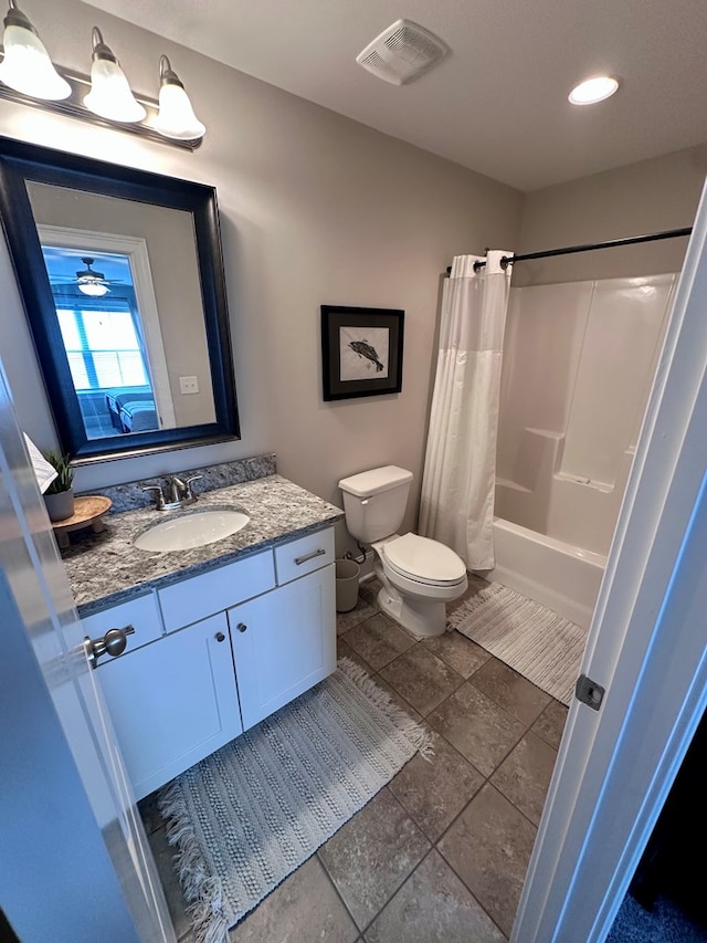 full bathroom featuring visible vents, shower / tub combo, vanity, toilet, and recessed lighting