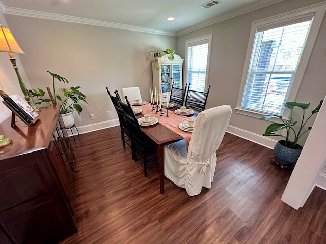dining space with baseboards, recessed lighting, dark wood finished floors, and crown molding