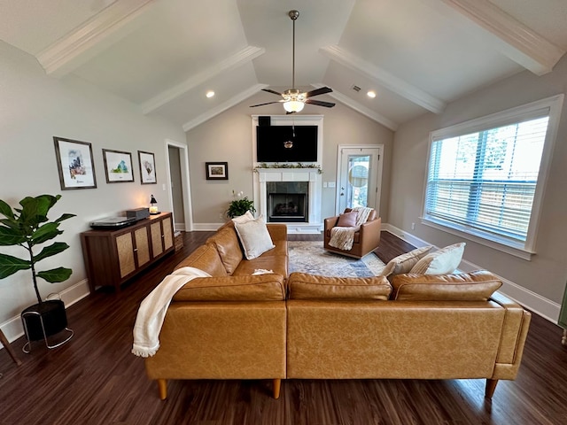 living room featuring a fireplace, ceiling fan, baseboards, and dark wood-type flooring