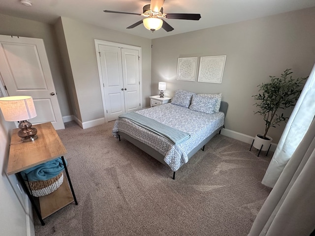 carpeted bedroom featuring baseboards, ceiling fan, and a closet