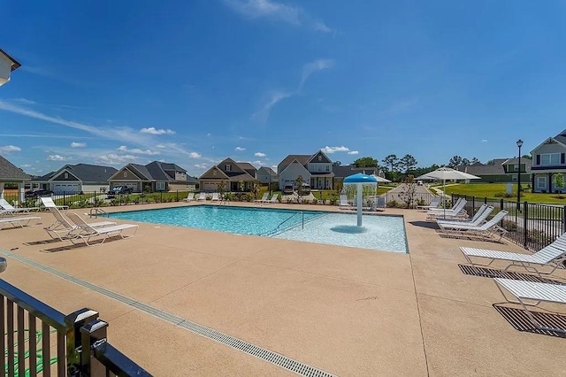 144 Ridgeview Dr, Dothan, AL 36301 - community pool featuring a patio area and a residential view