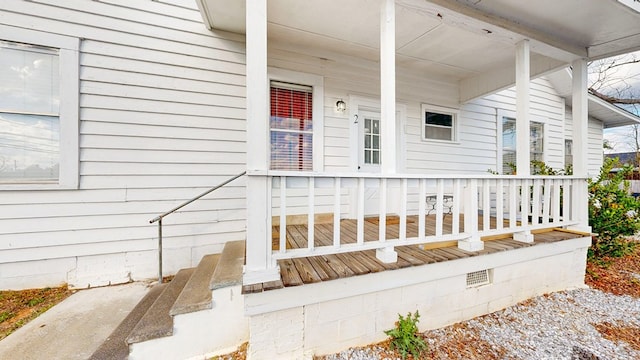 property entrance with a porch