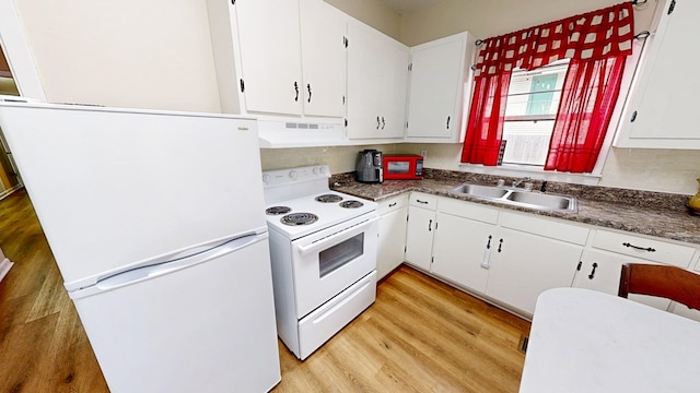 kitchen with white cabinetry, sink, white appliances, and light hardwood / wood-style floors