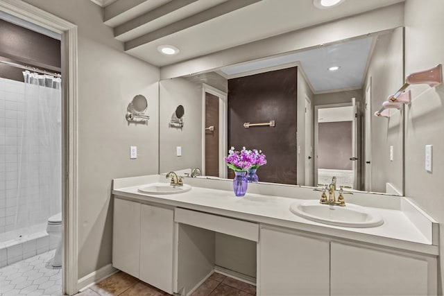122 Greenview Cir, Dothan, AL 36301 - full bathroom featuring tile patterned flooring, double vanity, a tile shower, toilet, and ornamental molding