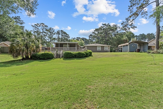 122 Greenview Cir, Dothan, AL 36301 - view of green lawn with a detached carport and a sunroom