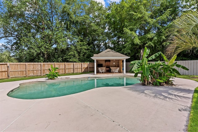 122 Greenview Cir, Dothan, AL 36301 - view of pool with a patio, a fenced backyard, and an outbuilding
