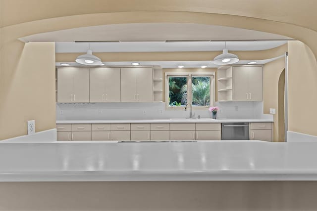 122 Greenview Cir, Dothan, AL 36301 - kitchen featuring open shelves, dishwasher, a sink, and hanging light fixtures