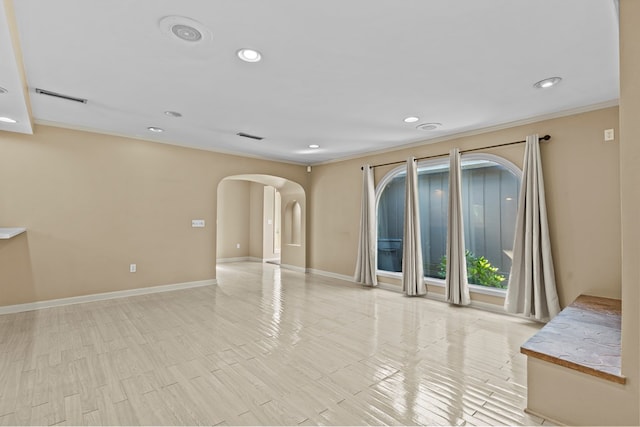 122 Greenview Cir, Dothan, AL 36301 - empty room featuring arched walkways, recessed lighting, baseboards, and crown molding