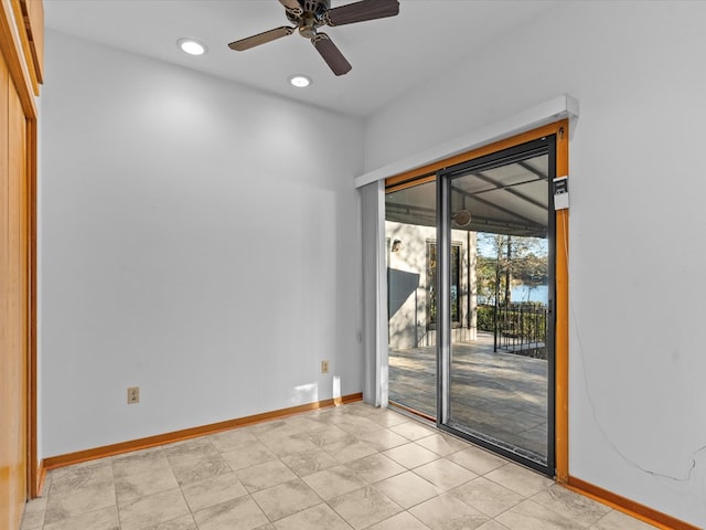 unfurnished room featuring ceiling fan