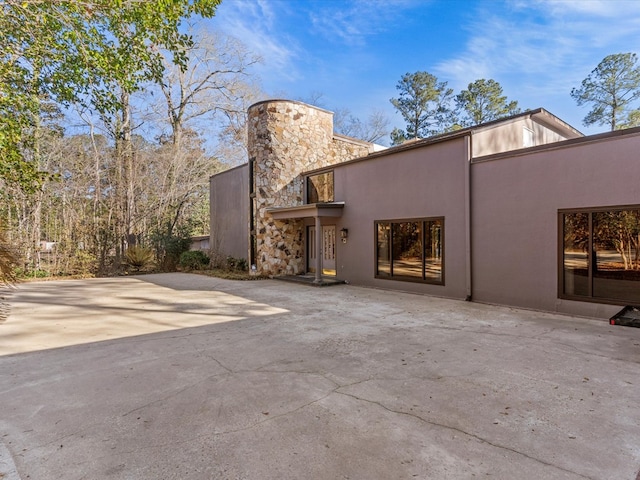 back of house featuring a patio area