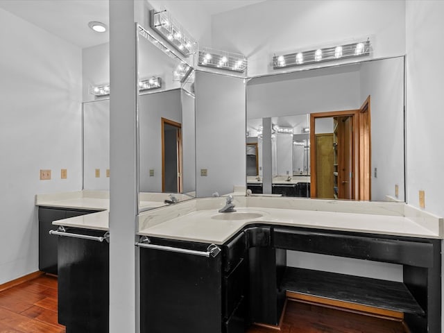 bathroom featuring vanity and hardwood / wood-style floors