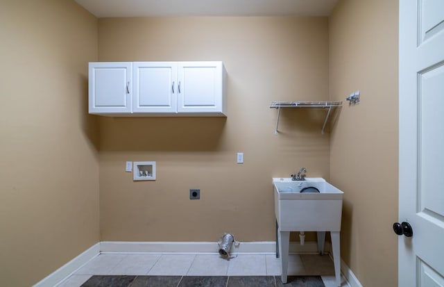 104 Ashwood Dr, Dothan, AL 36303 - washroom featuring cabinet space, electric dryer hookup, tile patterned floors, and washer hookup