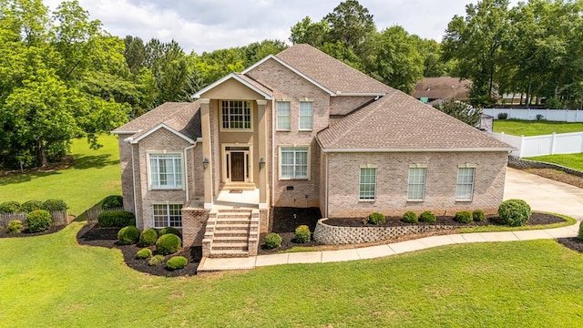 104 Ashwood Dr, Dothan, AL 36303 - view of front of house featuring brick siding and roof with shingles