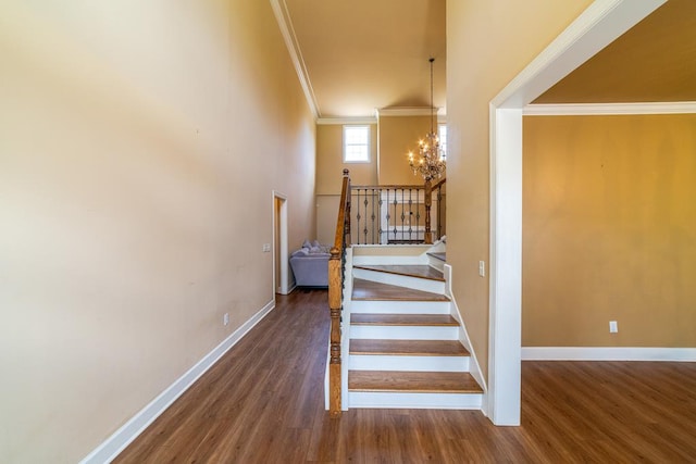 104 Ashwood Dr, Dothan, AL 36303 - staircase with crown molding, a chandelier, and wood finished floors