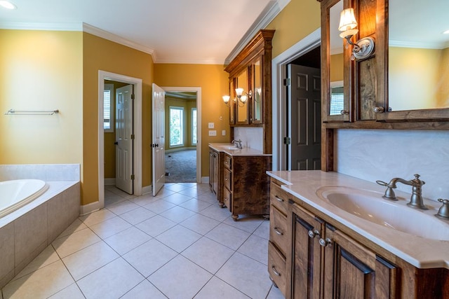 104 Ashwood Dr, Dothan, AL 36303 - full bathroom featuring tile patterned flooring, two vanities, a garden tub, and ornamental molding
