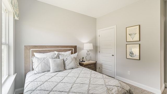 bedroom with baseboards