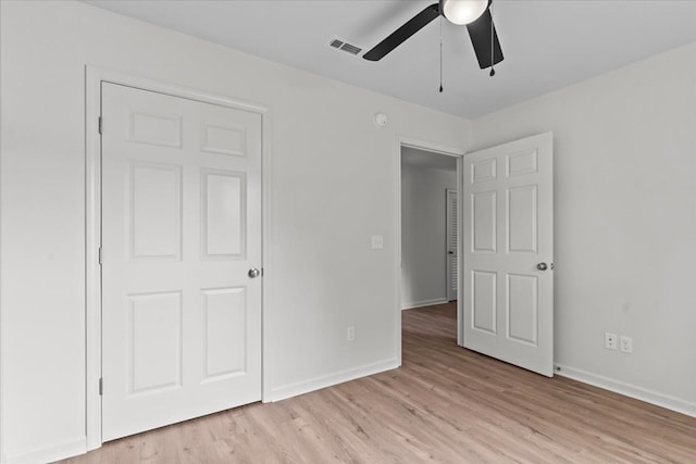 1182 N N Park Ave, Dothan, AL 36303 - unfurnished bedroom featuring light wood-style flooring and a ceiling fan