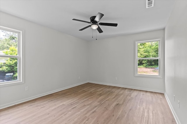 1182 N N Park Ave, Dothan, AL 36303 - spare room with light wood finished floors, healthy amount of natural light, and a ceiling fan