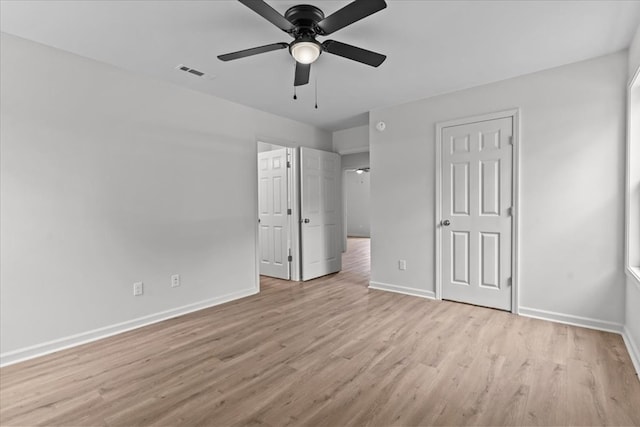1182 N N Park Ave, Dothan, AL 36303 - unfurnished bedroom featuring light wood-style floors and a ceiling fan