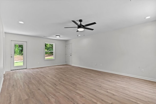 1182 N N Park Ave, Dothan, AL 36303 - empty room featuring light wood-style floors, a ceiling fan, and recessed lighting