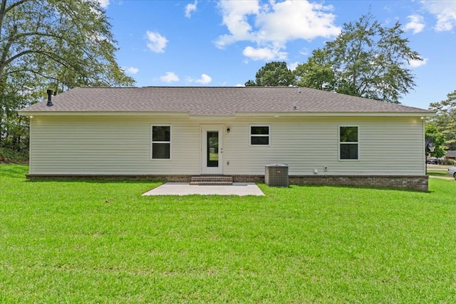 1182 N N Park Ave, Dothan, AL 36303 - rear view of property featuring a patio area, a lawn, and roof with shingles