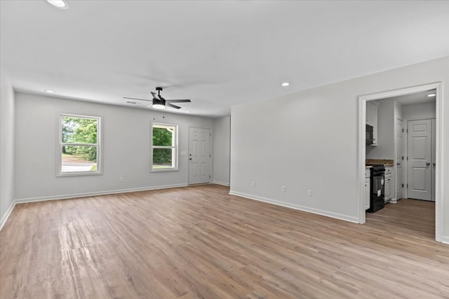 1182 N N Park Ave, Dothan, AL 36303 - empty room featuring a ceiling fan, light wood-style flooring, and recessed lighting
