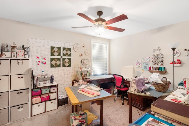 office space featuring light colored carpet and ceiling fan