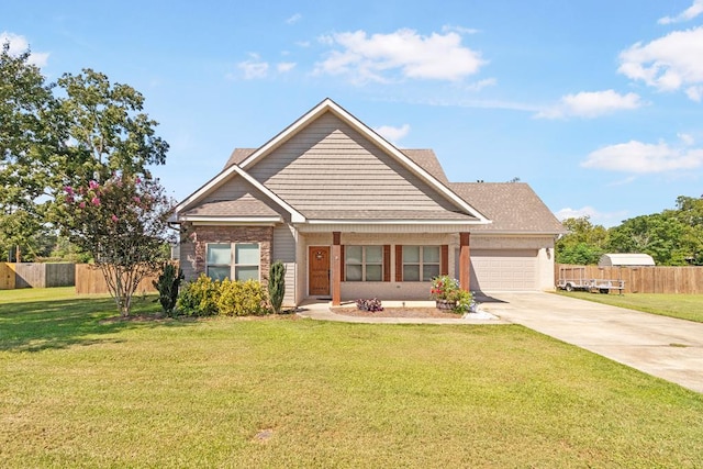 view of front facade featuring a garage and a front yard