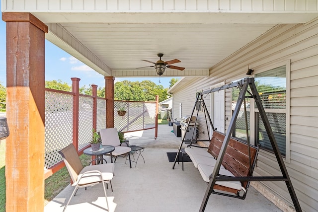 view of patio / terrace featuring area for grilling and ceiling fan