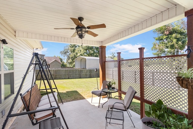 view of patio featuring ceiling fan