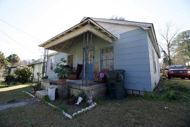 view of front of home featuring covered porch