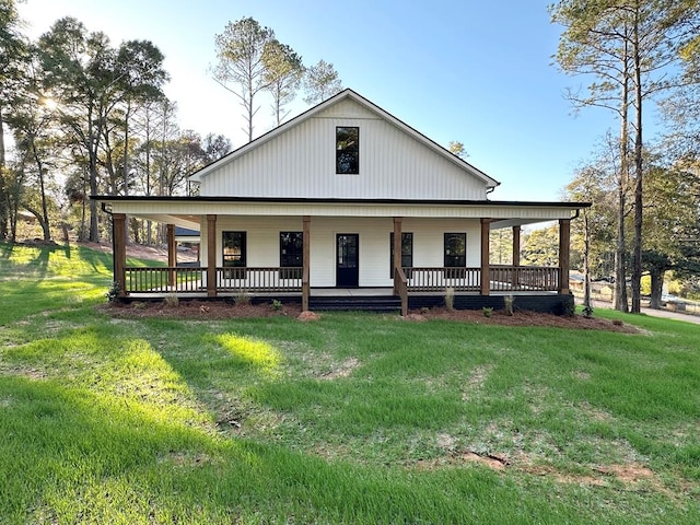 view of front of home with a front lawn and a porch