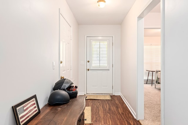 706 W Roxbury Rd, Dothan, AL 36305 - doorway featuring dark wood-type flooring and baseboards