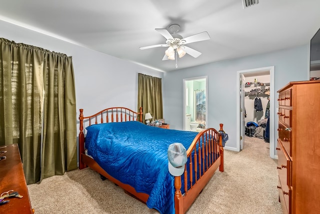 706 W Roxbury Rd, Dothan, AL 36305 - carpeted bedroom featuring a walk in closet, connected bathroom, and a ceiling fan